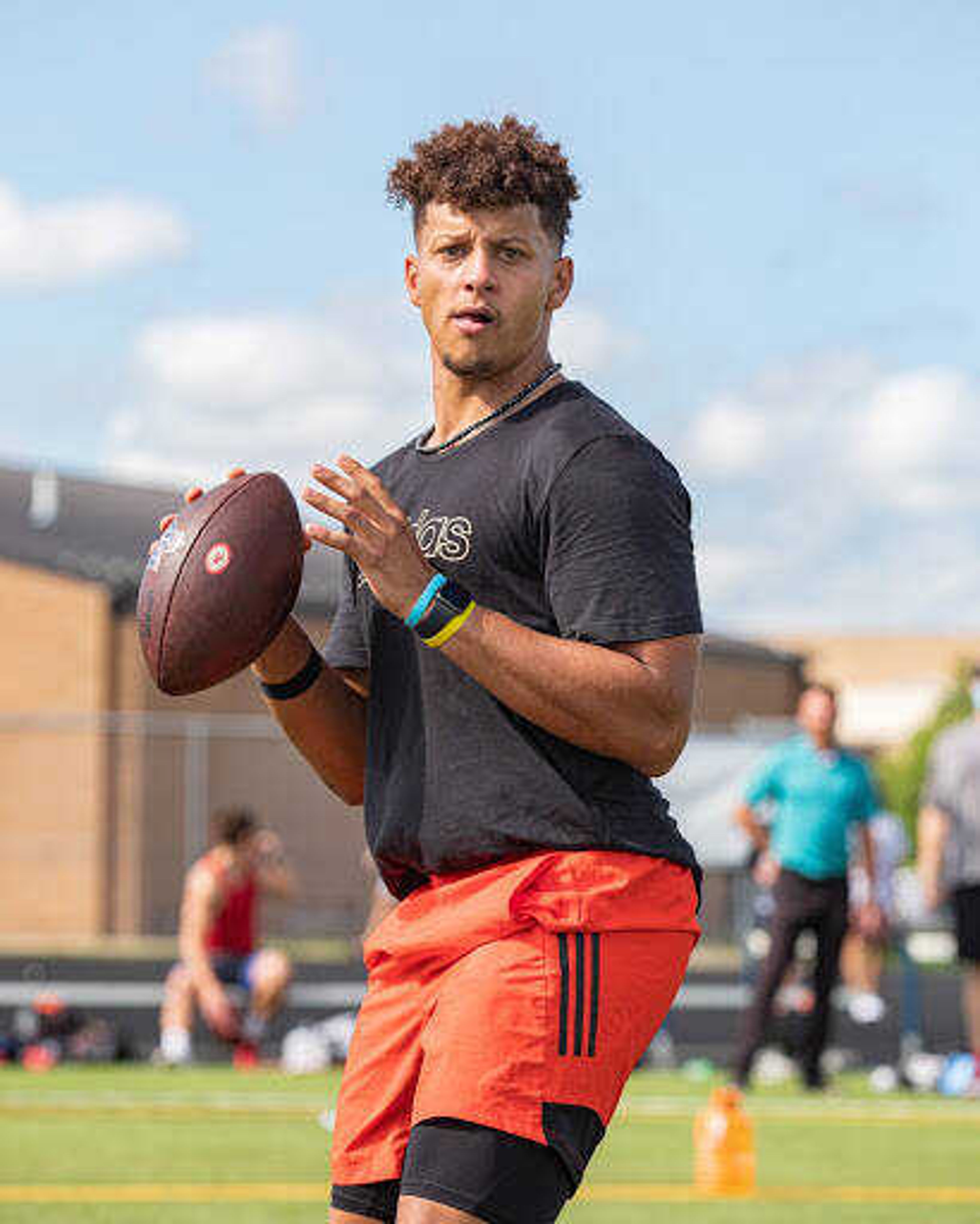 Kansas City Chiefs quarterback Patrick Mahomes looks downfield for his wide receiver during an off-season practice on July 22, 2020.