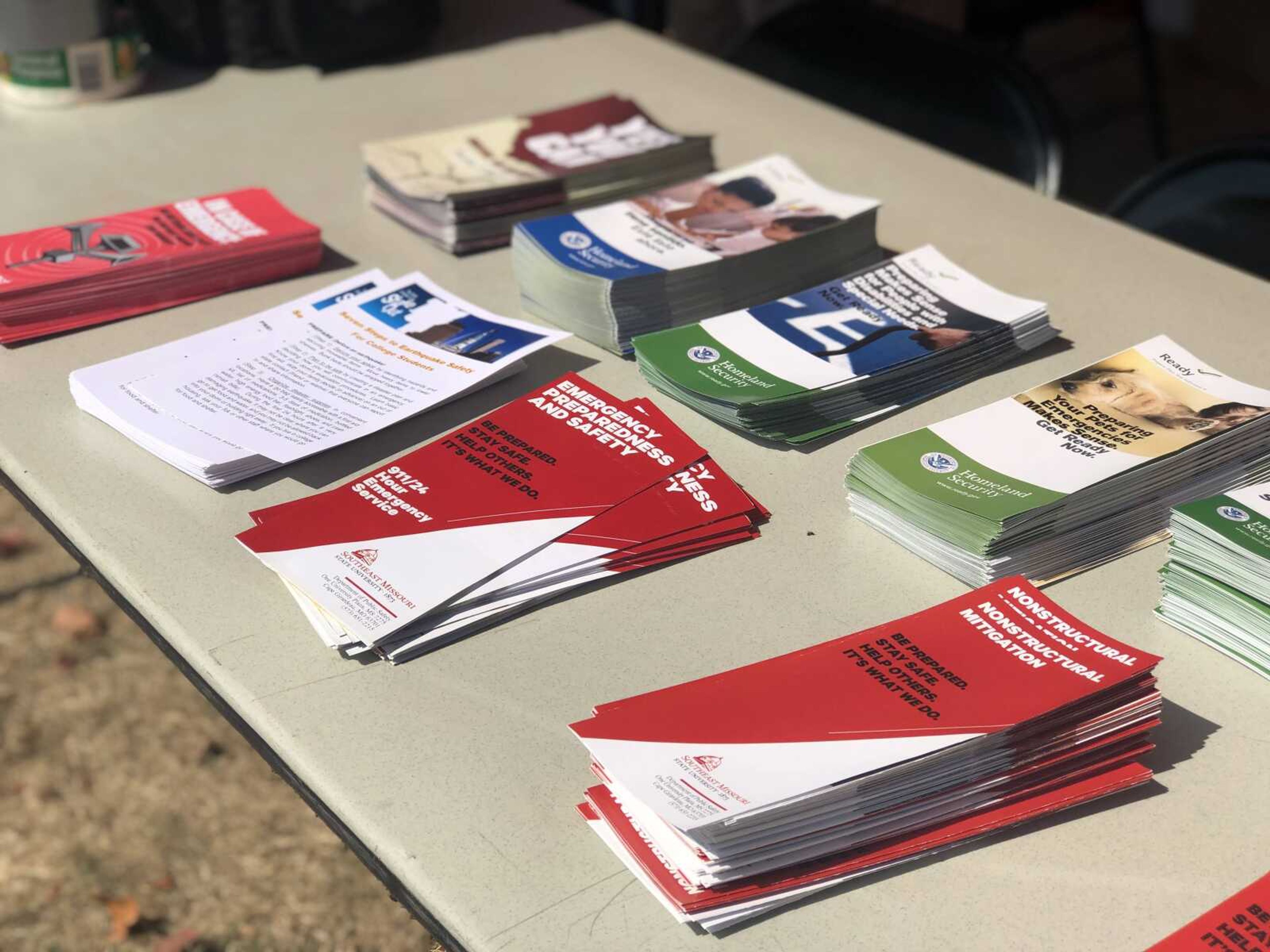 A variety of pamphlets regarding information about emergency events and other safety protocols were handed out on Wednesday, Sept. 18 in front of Kent Library in Cape Girardeau, Missouri.