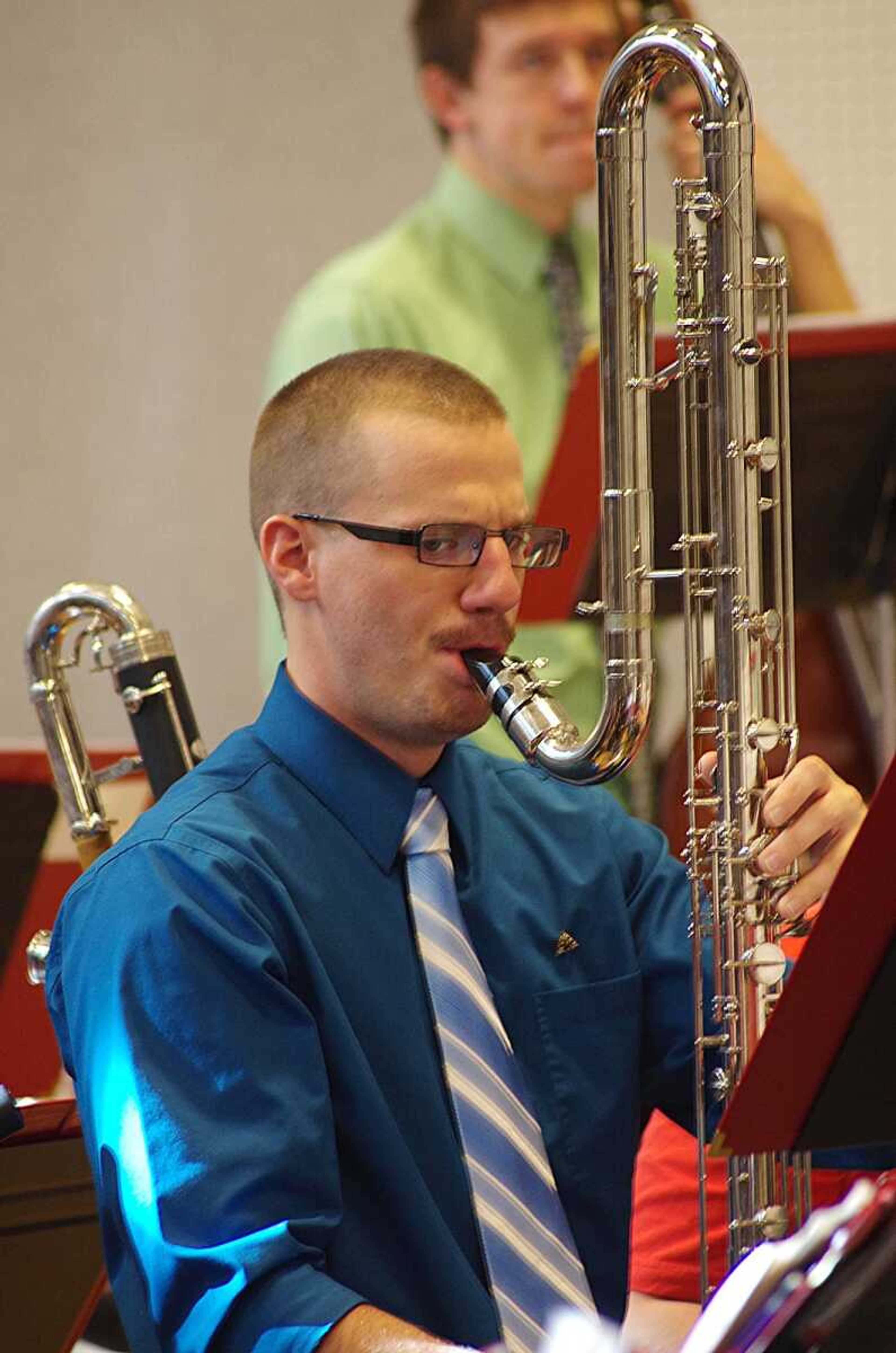 Southeast Wind Symphony member Tim Hanak rehearses for the "Hot and Saxy" concert. Photo by Nathan Hamilton