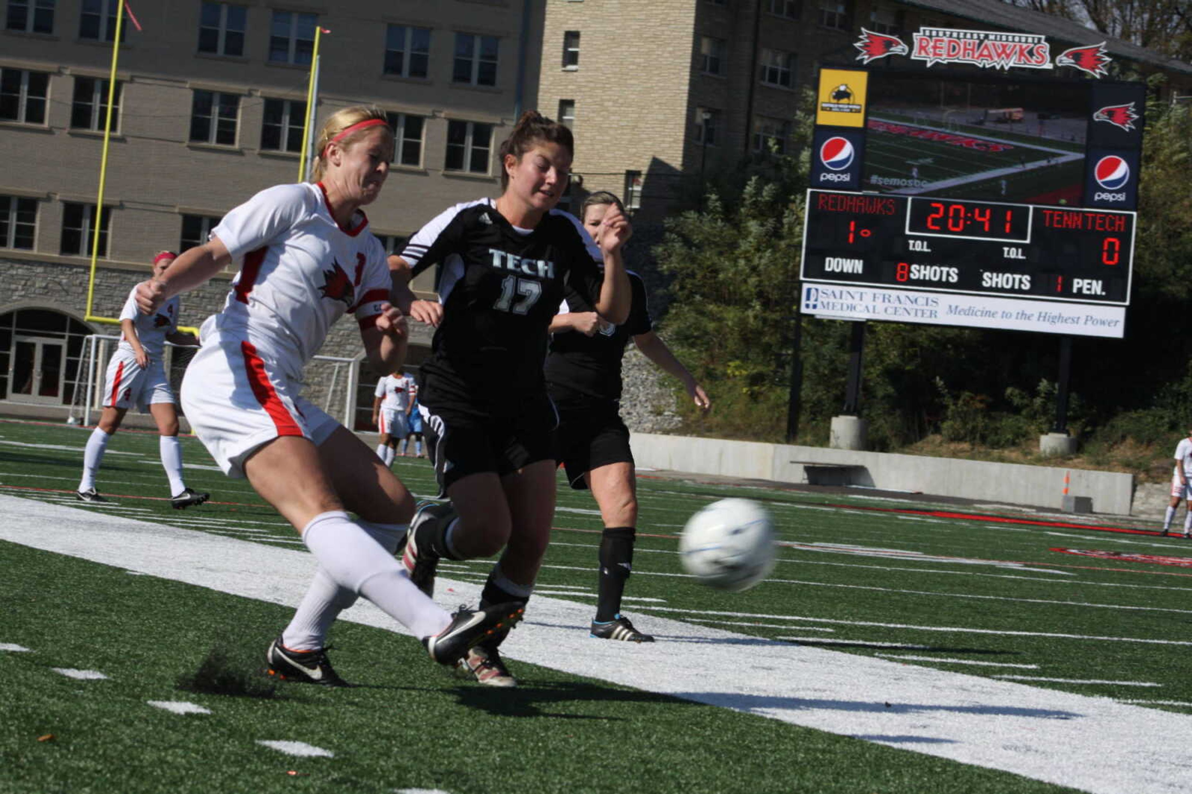 Southeast's Shona Goodwin and TTU's Taylor Hicks jostle for possession of the ball during the first half of Sunday's game. - Photo by Kelso Hope