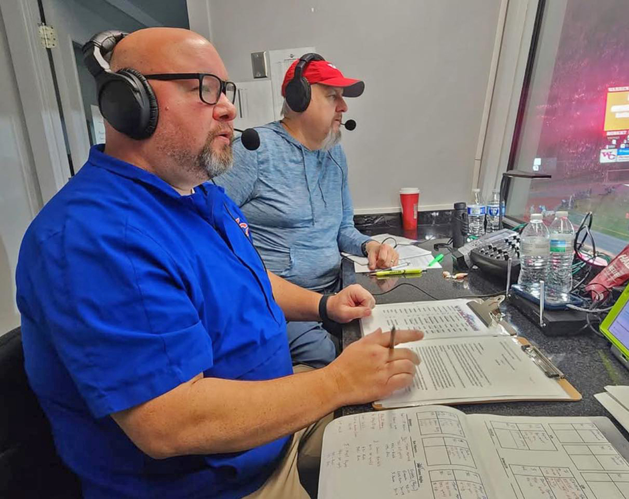 Image for 'A bucket list item': Warren Central radio announcer Brandon Davis prepares for championship game