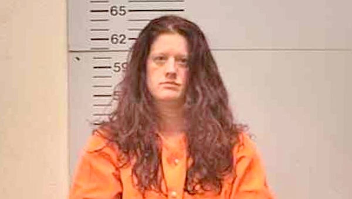 Woman charged with child abuse after stabbing children